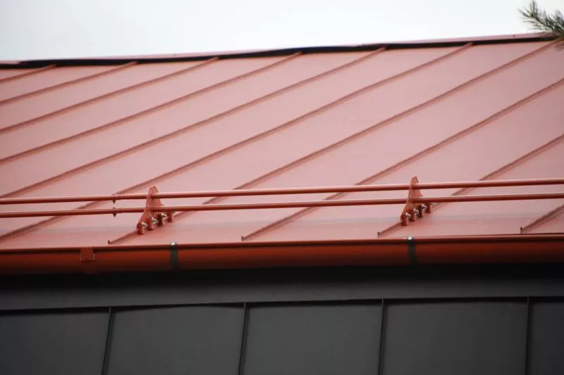 Фальц двойной стоячий Grand Line 0,45 Drap ST с пленкой на замках RAL 8004 терракота купить в краснодаре