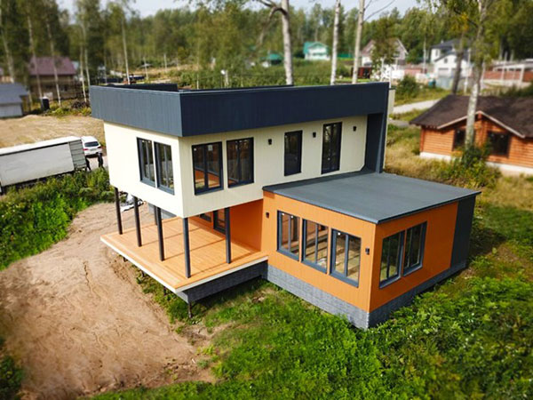 Двухэтажный дом с пристройкой дом необычной формы